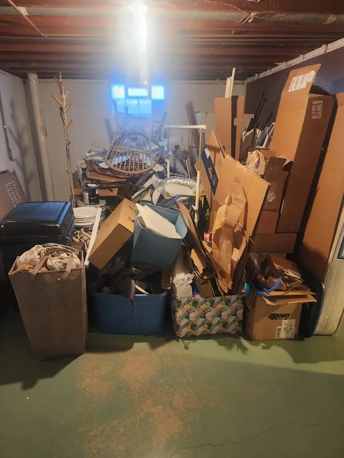 Roll-off dumpster container at job site for 15 Yard Dumpster Rental in Bend